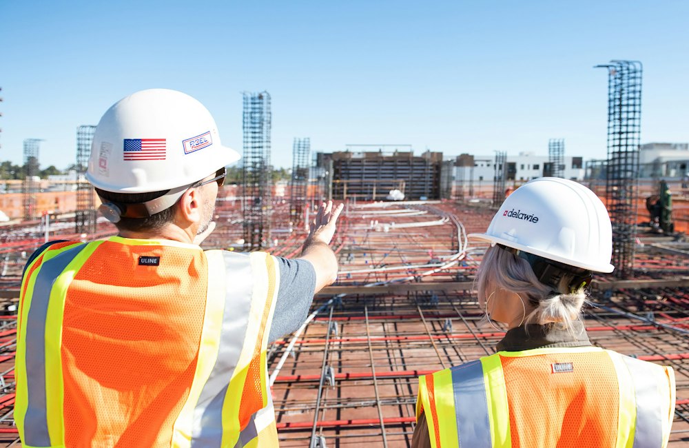 Construction workers in safety vests